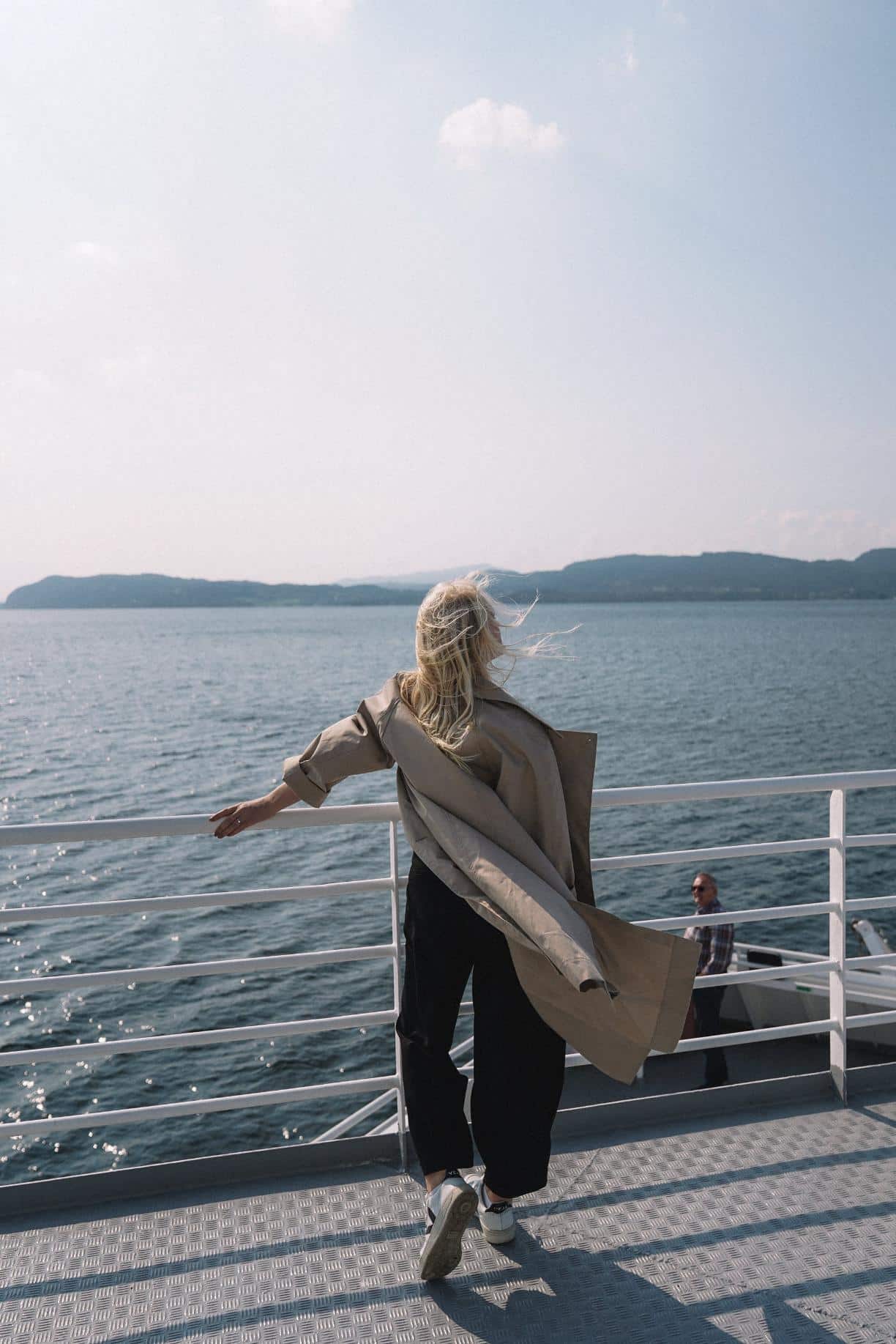 Girl standing on boat